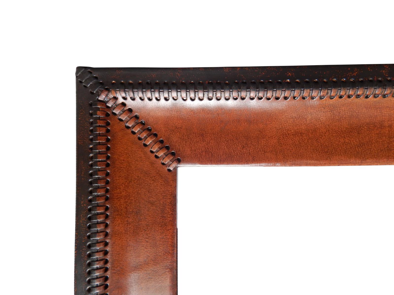 Handmade custom frame covered in natural leather and hand stitches