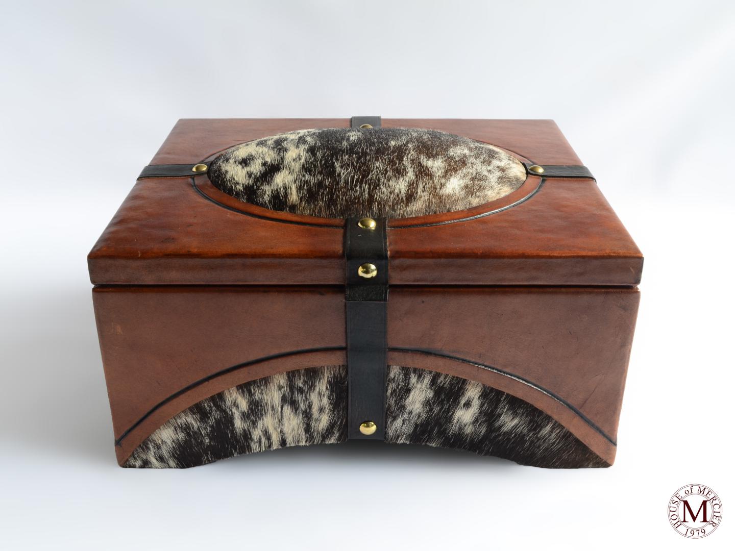 leather box with a cowhide hair real black/white color and belts