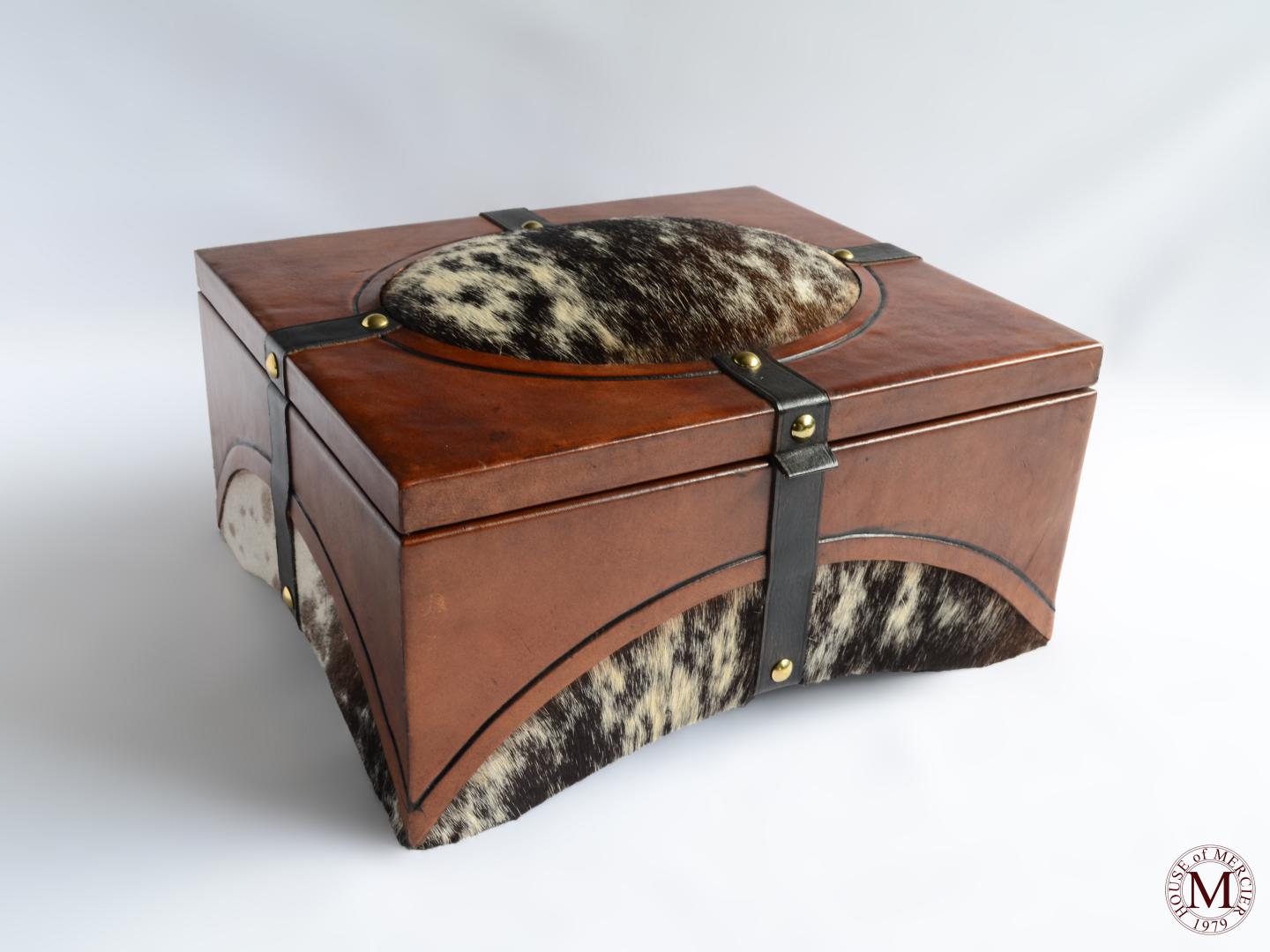 leather box with a cowhide hair real black/white color and belts